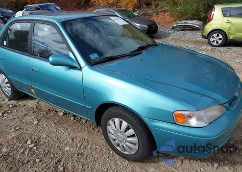 1999 Toyota Corolla Le z USA, uszkodzony, nr VIN 2T1BR12E2XC208457